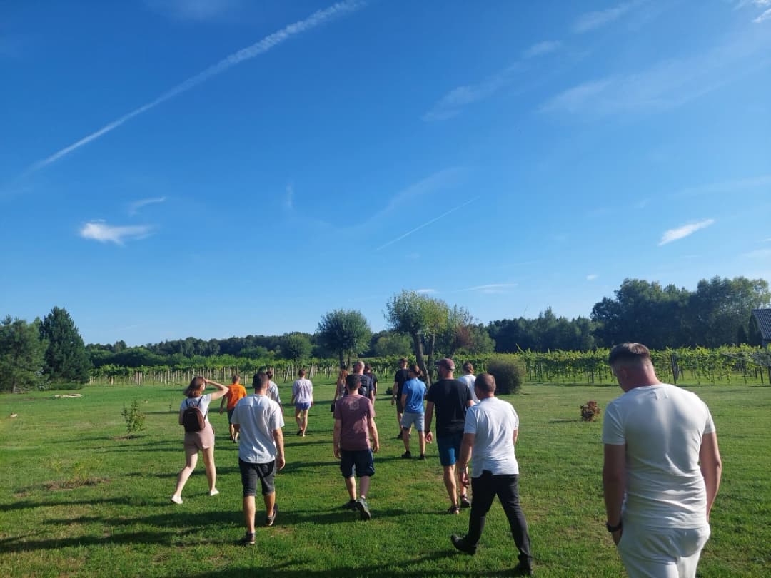 Naturaily employees taking a walk around a vineyard