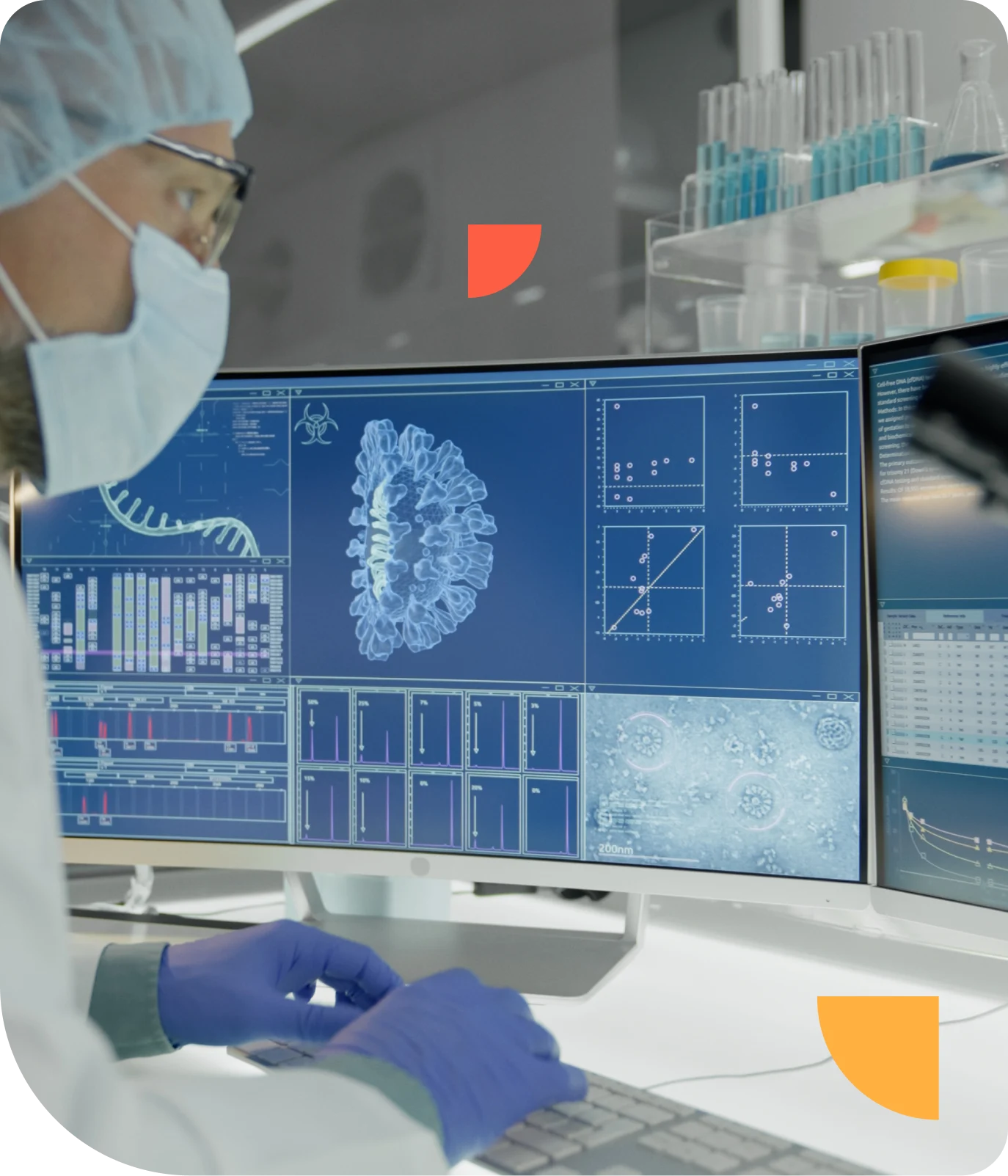 Scientist in lab attire analyzes virus structure on computer screens, surrounded by lab equipment and test tubes.