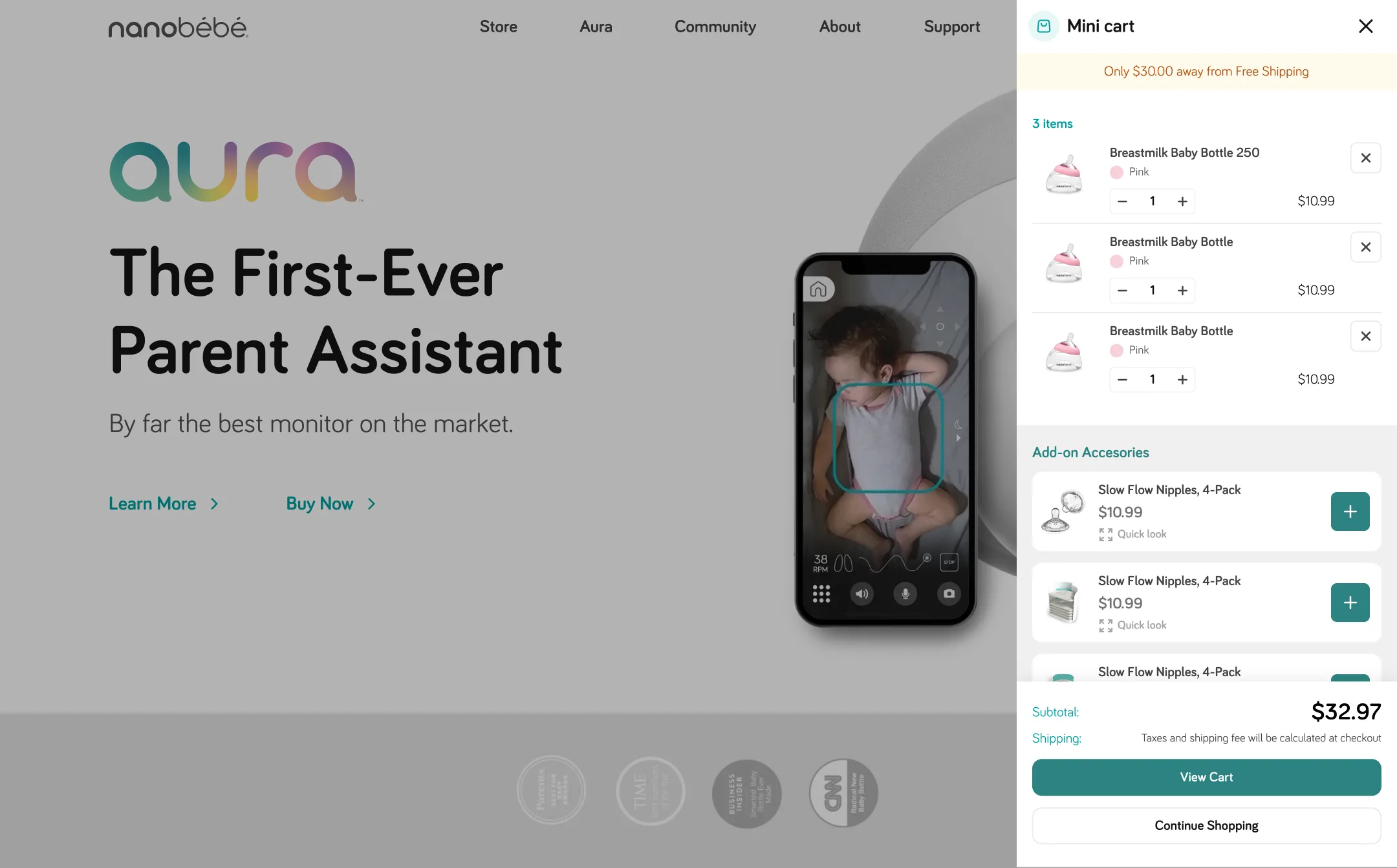 Website for Aura, a parent assistant monitor, featuring a shopping cart with baby bottles and accessories, totaling $32.97.